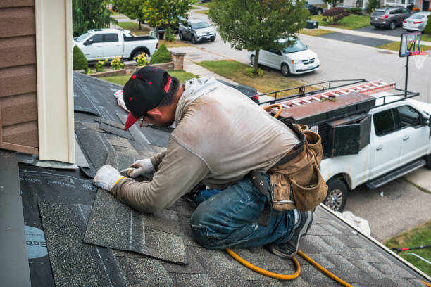 Professional Roof Replacement technician working in Russell, IL
